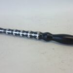 Rúčka na bič vylievaná cín+striebro, vlnkovaný povrch